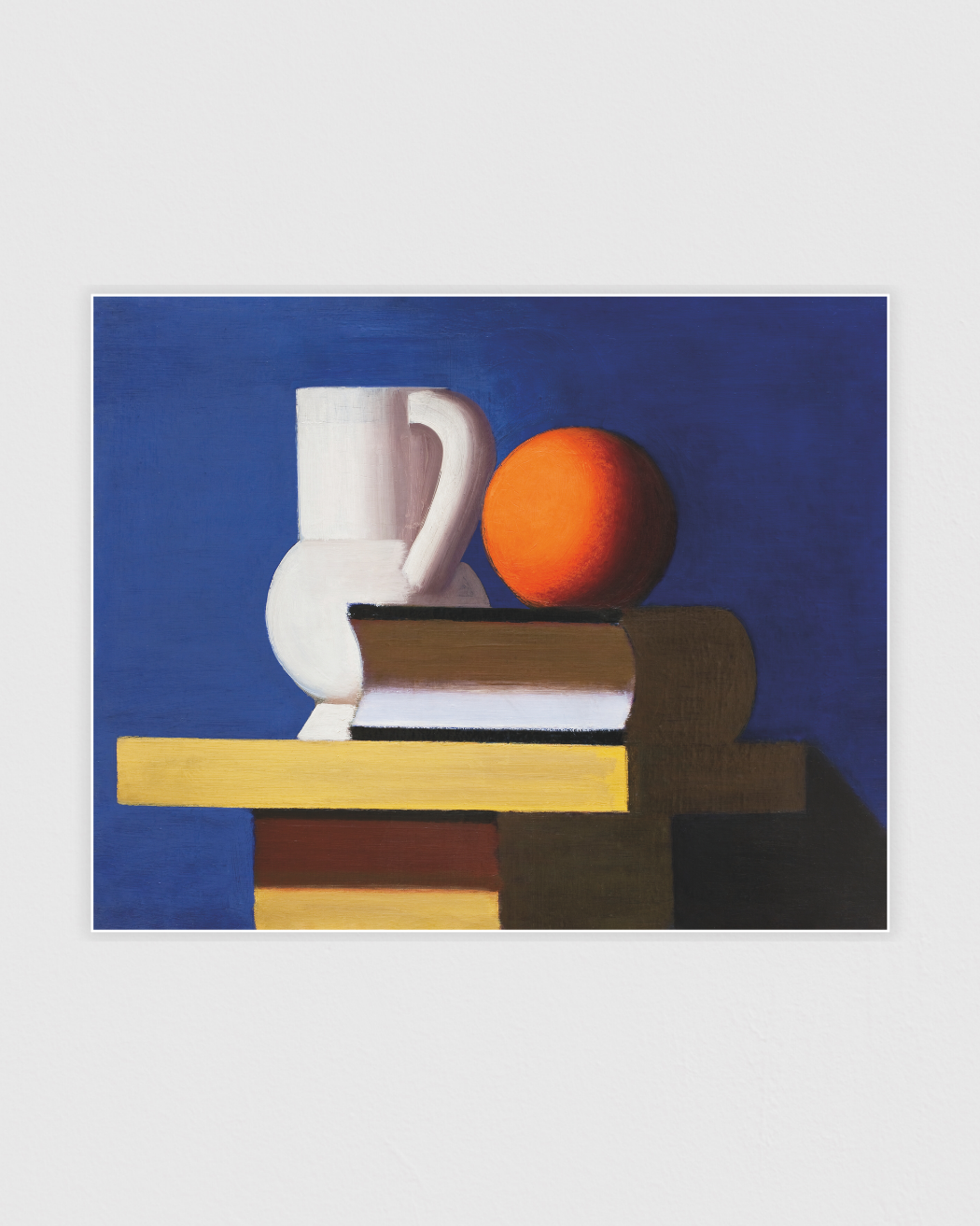 Arrangement with white jug, orange and book