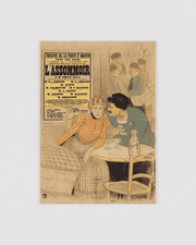 Man en vrouw zitten aan een tafel in een café
